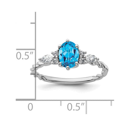 14K Weißgold Ring mit Diamant und 7x5 ovalem Dezember-/Blautopas, Größe 7, gedreht