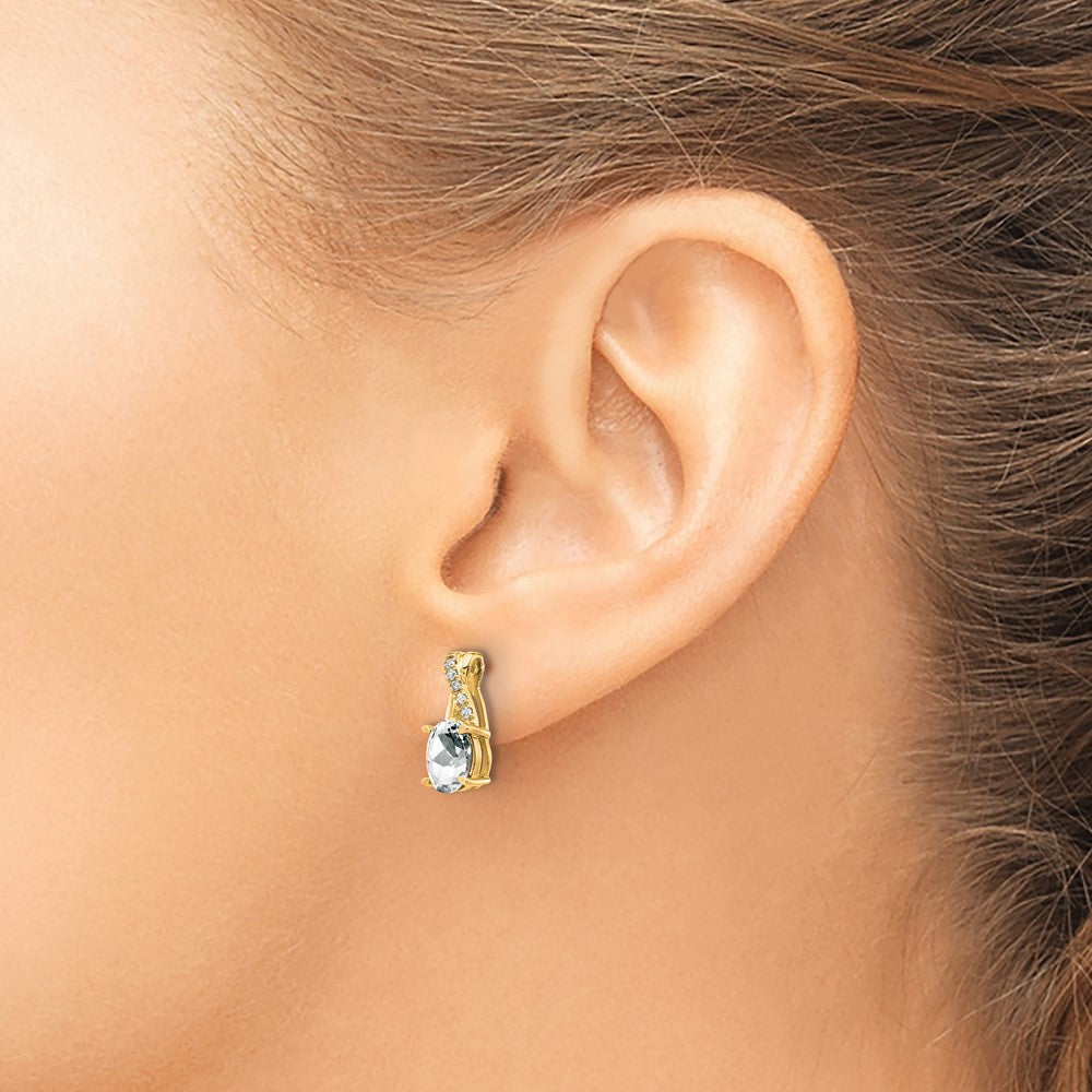 14K Gelbgold Ohrstecker mit ovalem Topas (April) 7x5 mm und Diamanten