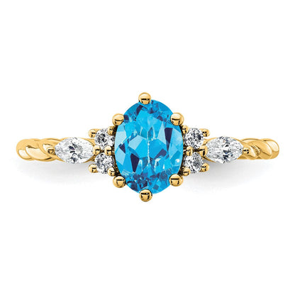 14K Gelbgold Ring mit Diamanten und 7x5 ovalem Dezember-/Blautopas, Größe 7, gedreht