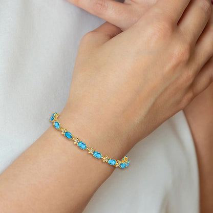 14K Gelbgold Armband mit Blumenmotiv, natürlichen Diamanten und Swiss Blue Topas