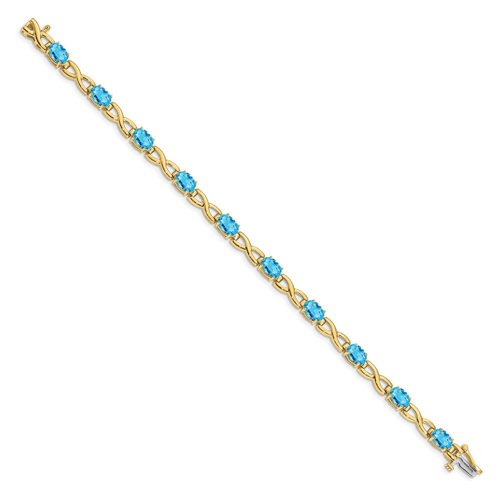 14 Karat Gelbgold Armband mit ovalem blauem Topas, 7 x 5 mm