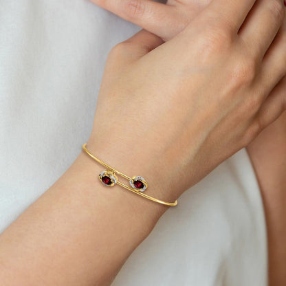 14K Gelbgold Armreif, flexibel, poliert, mit 0,6 ct. Granat und 0,03 ct. natürlichem Diamant