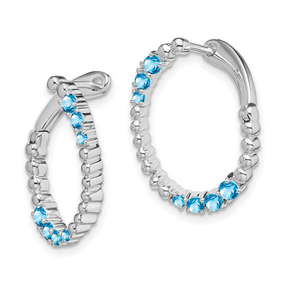 14K Weißgold Ohrringe mit ovalem blauem Topas in Creolenform