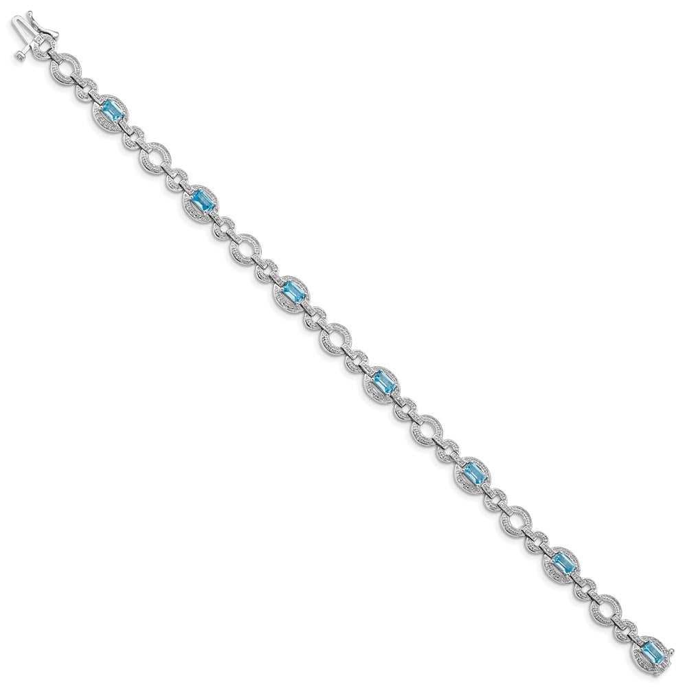 7 Zoll Sterlingsilber Rhodiniert Diamant. & Lt Schweizer Blautopas Oval Armband