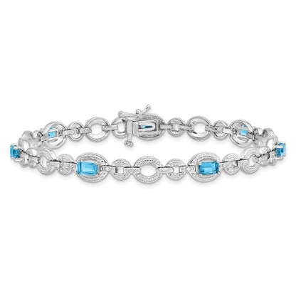 7 Zoll Sterlingsilber Rhodiniert Diamant. & Lt Schweizer Blautopas Oval Armband