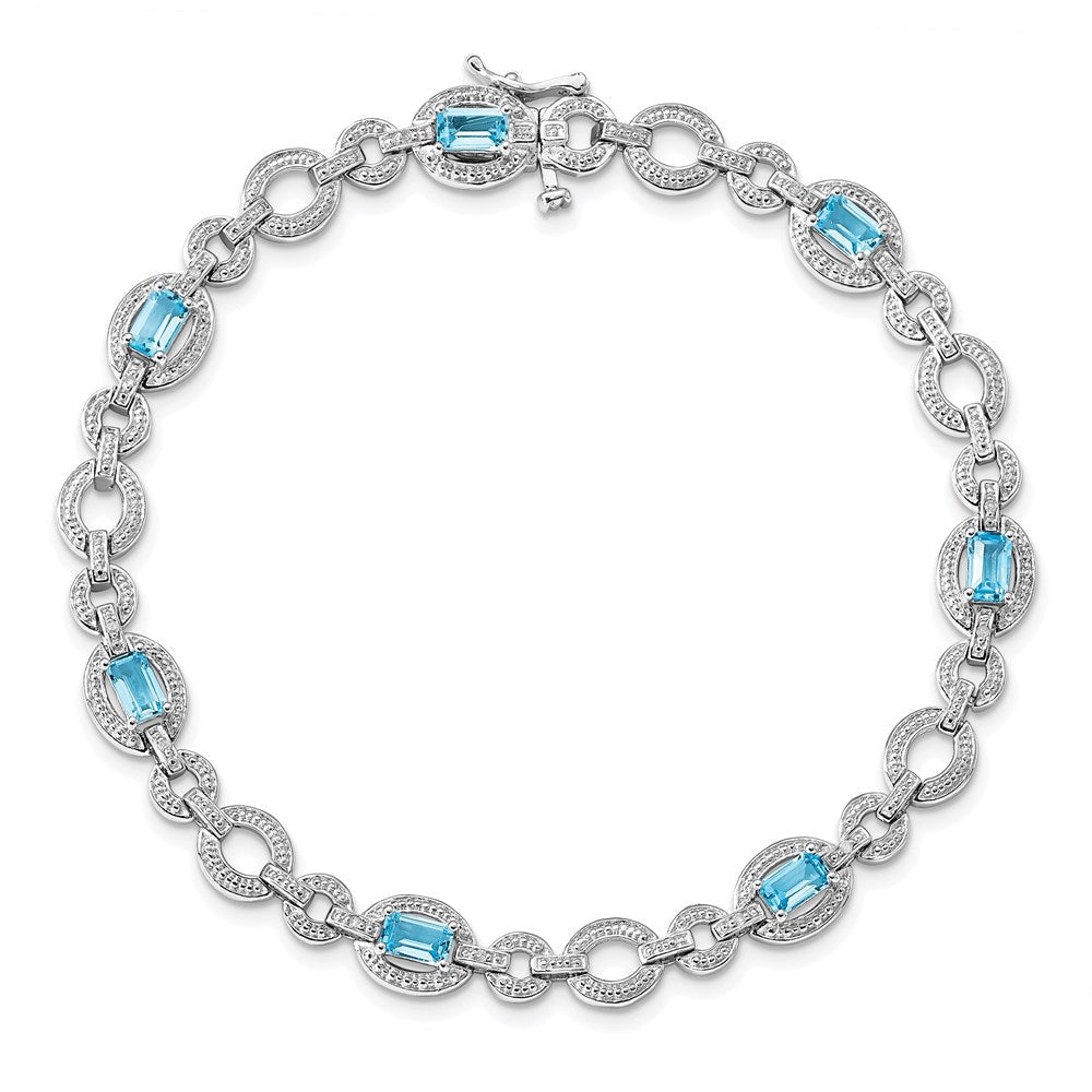7 Zoll Sterlingsilber Rhodiniert Diamant. & Lt Schweizer Blautopas Oval Armband