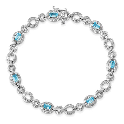 7 Zoll Sterlingsilber Rhodiniert Diamant. & Lt Schweizer Blautopas Oval Armband
