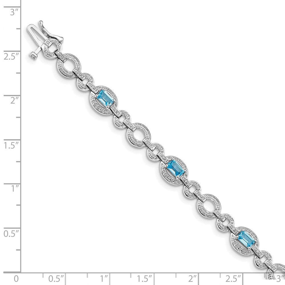 7 Zoll Sterlingsilber Rhodiniert Diamant. & Lt Schweizer Blautopas Oval Armband