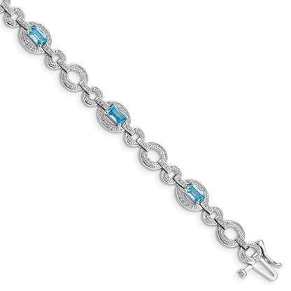 7 Zoll Sterlingsilber Rhodiniert Diamant. & Lt Schweizer Blautopas Oval Armband