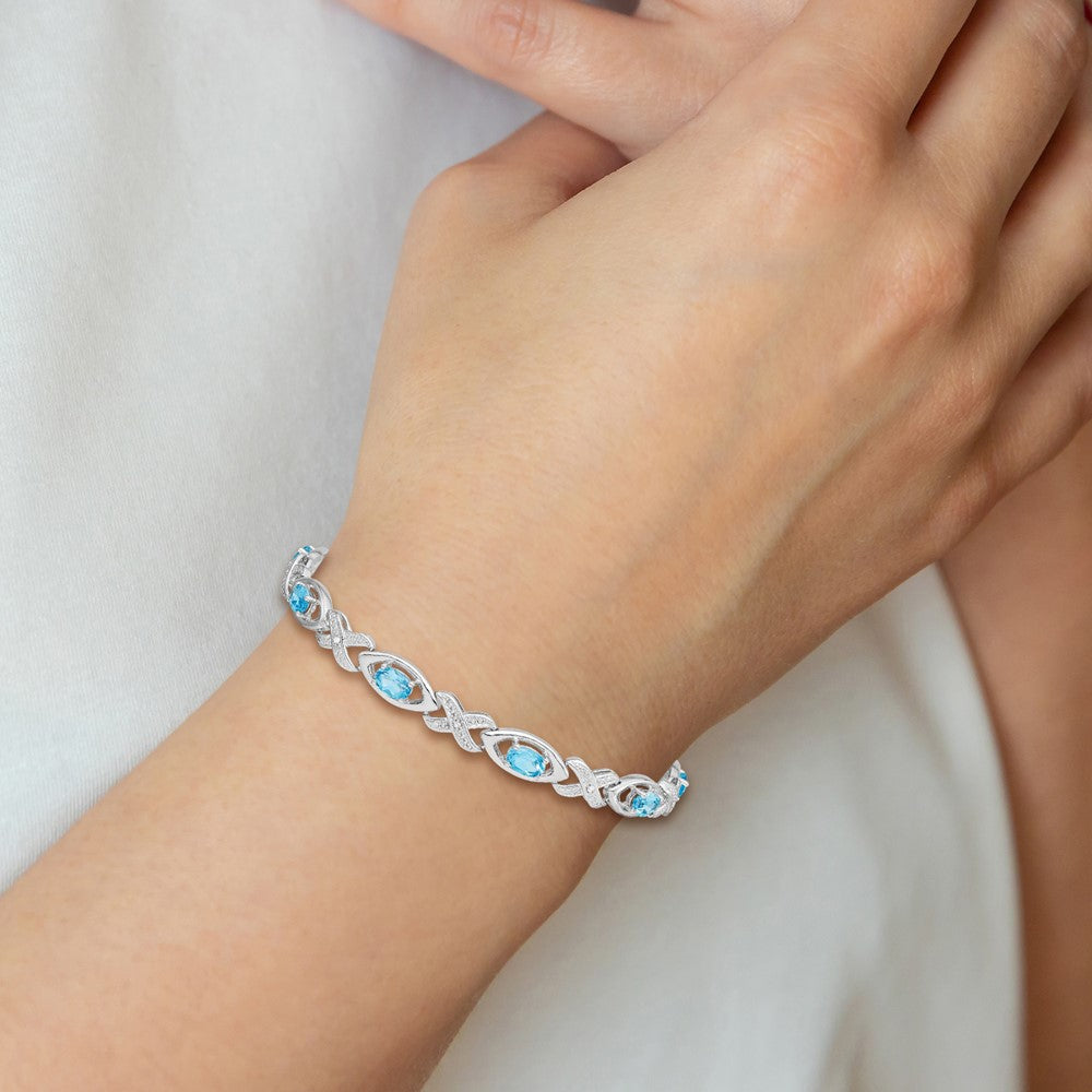 7 Zoll Sterlingsilber Rhodiniert Diamant & Licht Schweizer Blautopas Armband