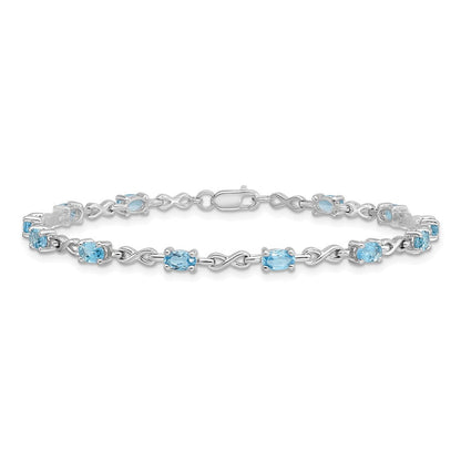 7 Zoll Sterlingsilber Rhodiniert Blautopas Armband