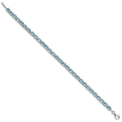 7 Zoll Sterlingsilber Rhodiniert Blautopas und Diamant Armband