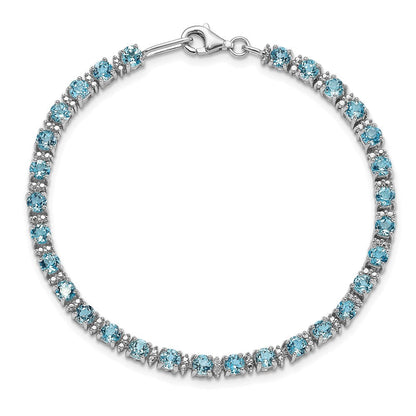 7 Zoll Sterlingsilber Rhodiniert Blautopas und Diamant Armband