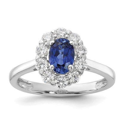 10K Weißgold Ring mit 0,625 ct. im Labor gezüchteten Diamanten VS/SI+ G+ und ovalem im Labor gezüchtetem blauem Saphir-Halo