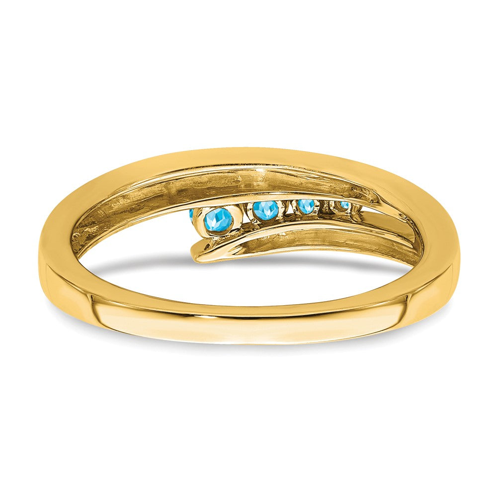 14K Gelbgold Ring mit blauem Topas, 4 Steine