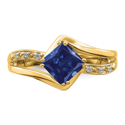 14K Gelbgold Ring mit synthetischem Saphir und echtem Diamant