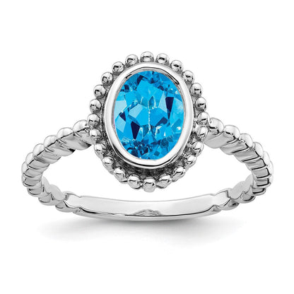 14K Weißgold Ring mit ovalem blauem Topas