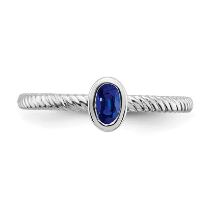 14K Weißgold Ring mit Saphir im Ovalschliff in Zargenfassung