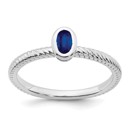14K Weißgold Ring mit Saphir im Ovalschliff in Zargenfassung