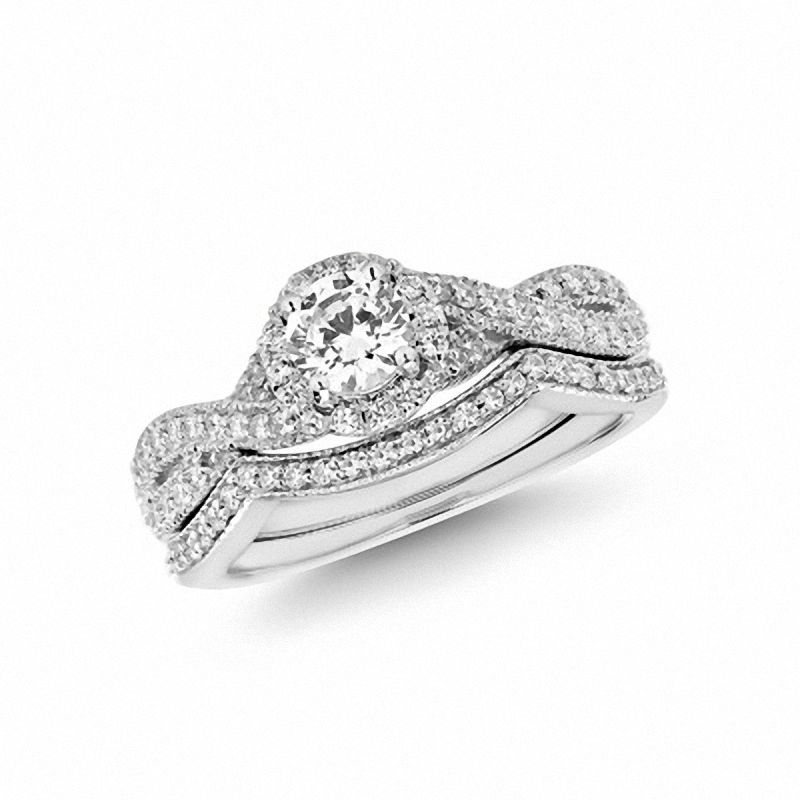 Brautset mit Diamanten 0,75 ct. Gesamtgewicht, gedrehter Ring, 14K Weißgold