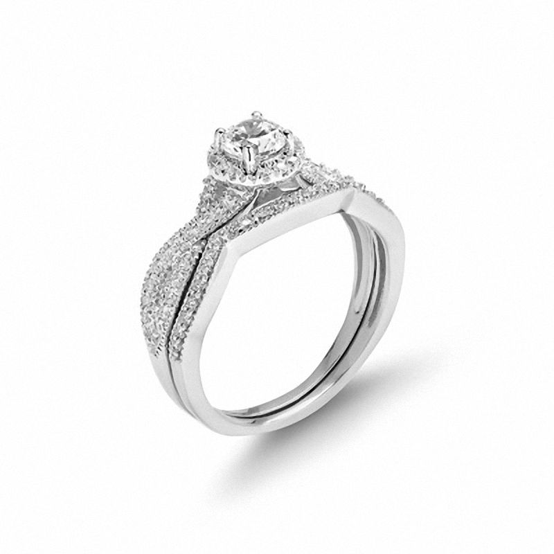 Brautset mit Diamanten 0,75 ct. Gesamtgewicht, gedrehter Ring, 14K Weißgold