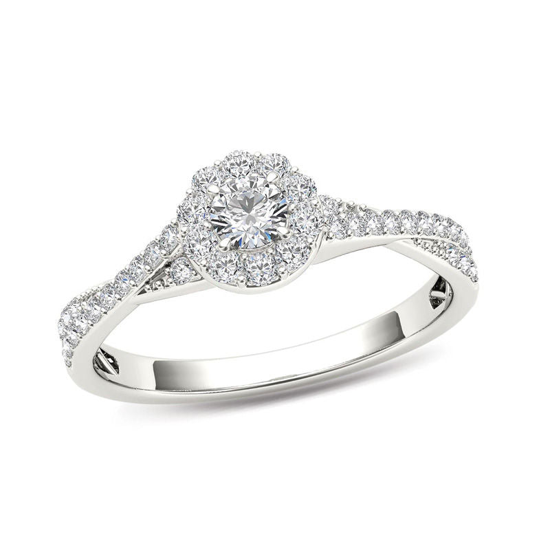 0,5 ct. Diamant-Ring mit Halo und gedrehtem Ringband in 14K Weißgold