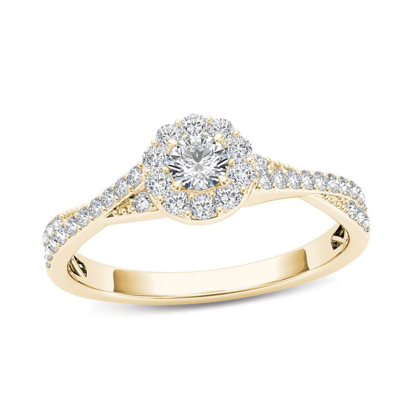 Verlobungsring mit Diamant-Halo und gedrehter Ringschiene, 0,5 ct. Gesamtgewicht, aus 14K Gold