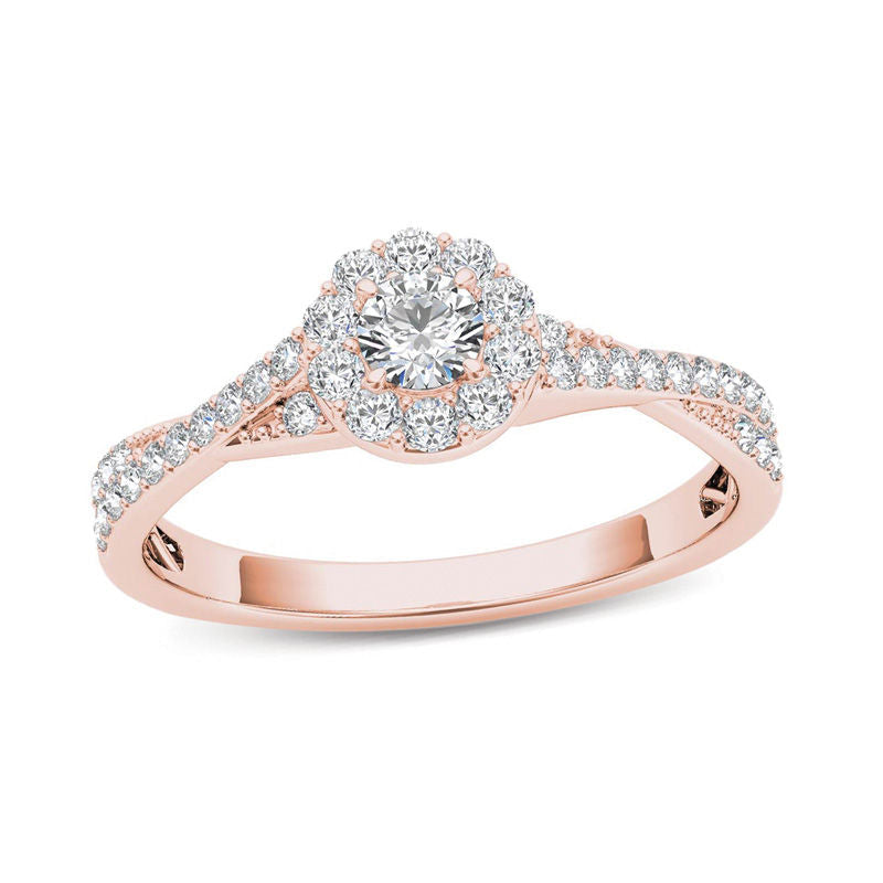 Verlobungsring mit Diamant-Halo und gedrehtem Ringschaft aus 14K Roségold, 0,5 ct Gesamtgewicht