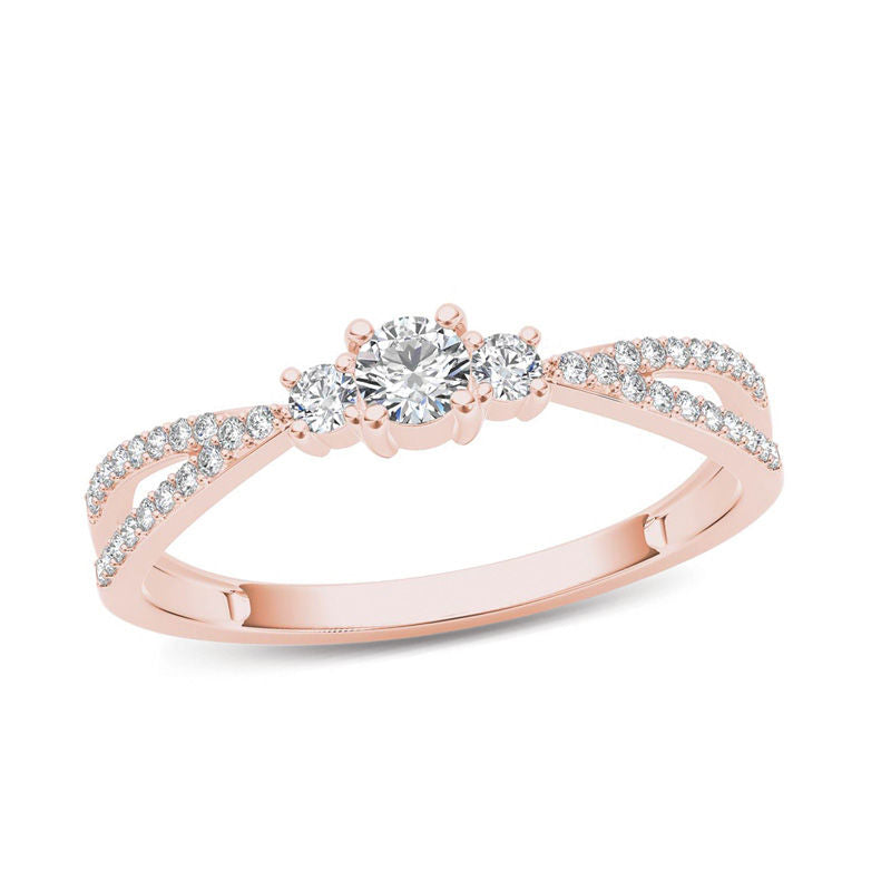 0,25 ct. Dreistein-Verlobungsring mit Diamanten und geteiltem Ringschaft aus 14K Roségold