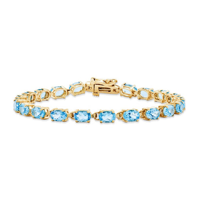 14K Gelbgold 6x4mm Oval Blautopas Armband