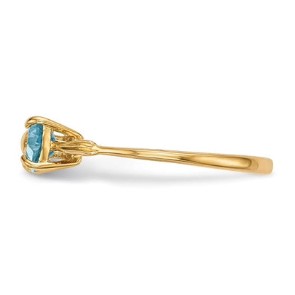 Massiver Ring aus 14K Gelbgold mit poliertem hellblauen simulierten Schweizer Blautopas in Schleifen-Design