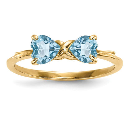 Massiver Ring aus 14K Gelbgold mit poliertem hellblauen simulierten Schweizer Blautopas in Schleifen-Design