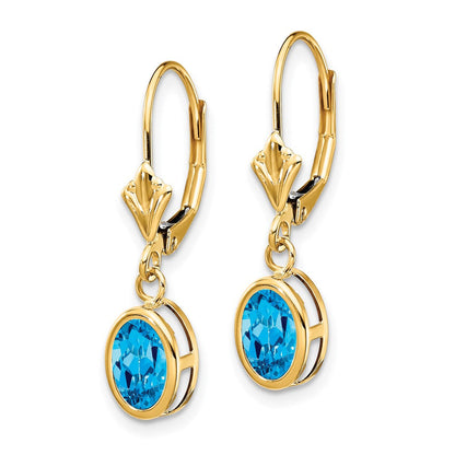 14K Gelbgold Ohrringe mit ovalem blauem Topas (7x5mm) und Leverback-Verschluss