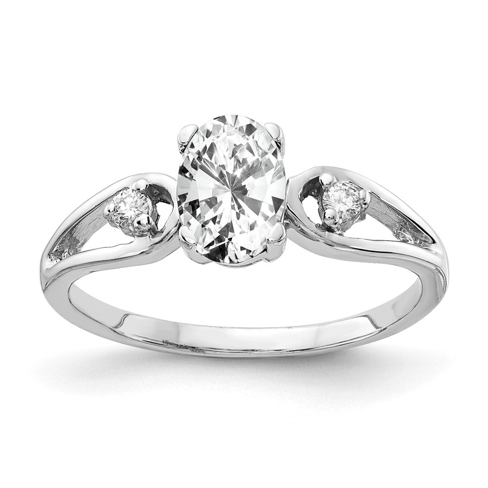 Ring aus 14K Weißgold mit 7x5mm ovalem Zirkonia und einem echten Diamanten