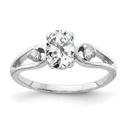 Ring aus 14K Weißgold mit 7x5mm ovalem Zirkonia und einem echten Diamanten