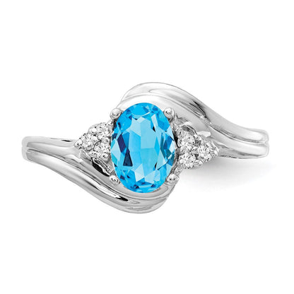 14 Karat Weißgold Ring mit 7x5 mm ovalem Blautopas im Schachbrettschliff AA und echten Diamanten