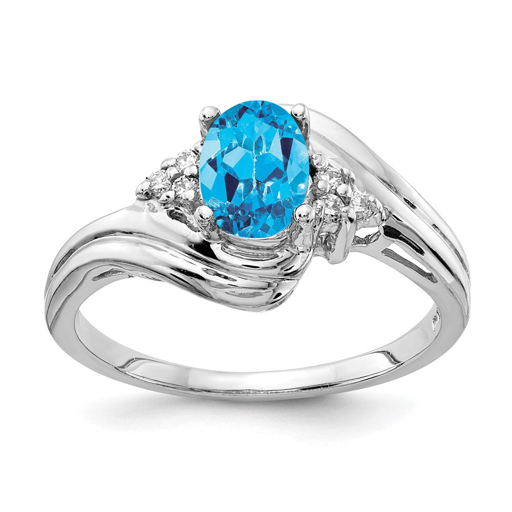 14 Karat Weißgold Ring mit 7x5 mm ovalem Blautopas im Schachbrettschliff AA und echten Diamanten