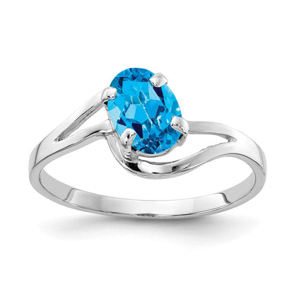 14K Weißgold Ring mit ovalem blauem Topas, 7x5 mm