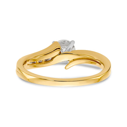 Verlobungsring mit Krappenfassung und simulierten Diamanten im Überkreuz-Design aus 14 Karat Gelbgold